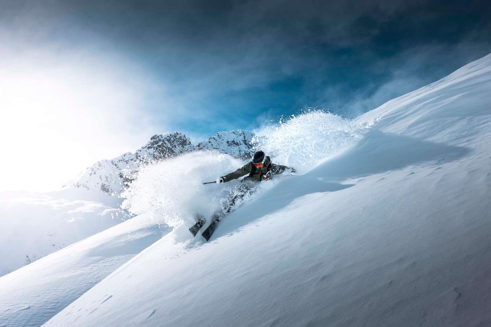 Action-packed powder snow descent in clear weather