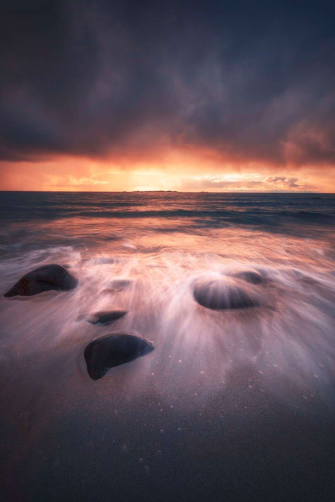 Evening glow over rocky coastline