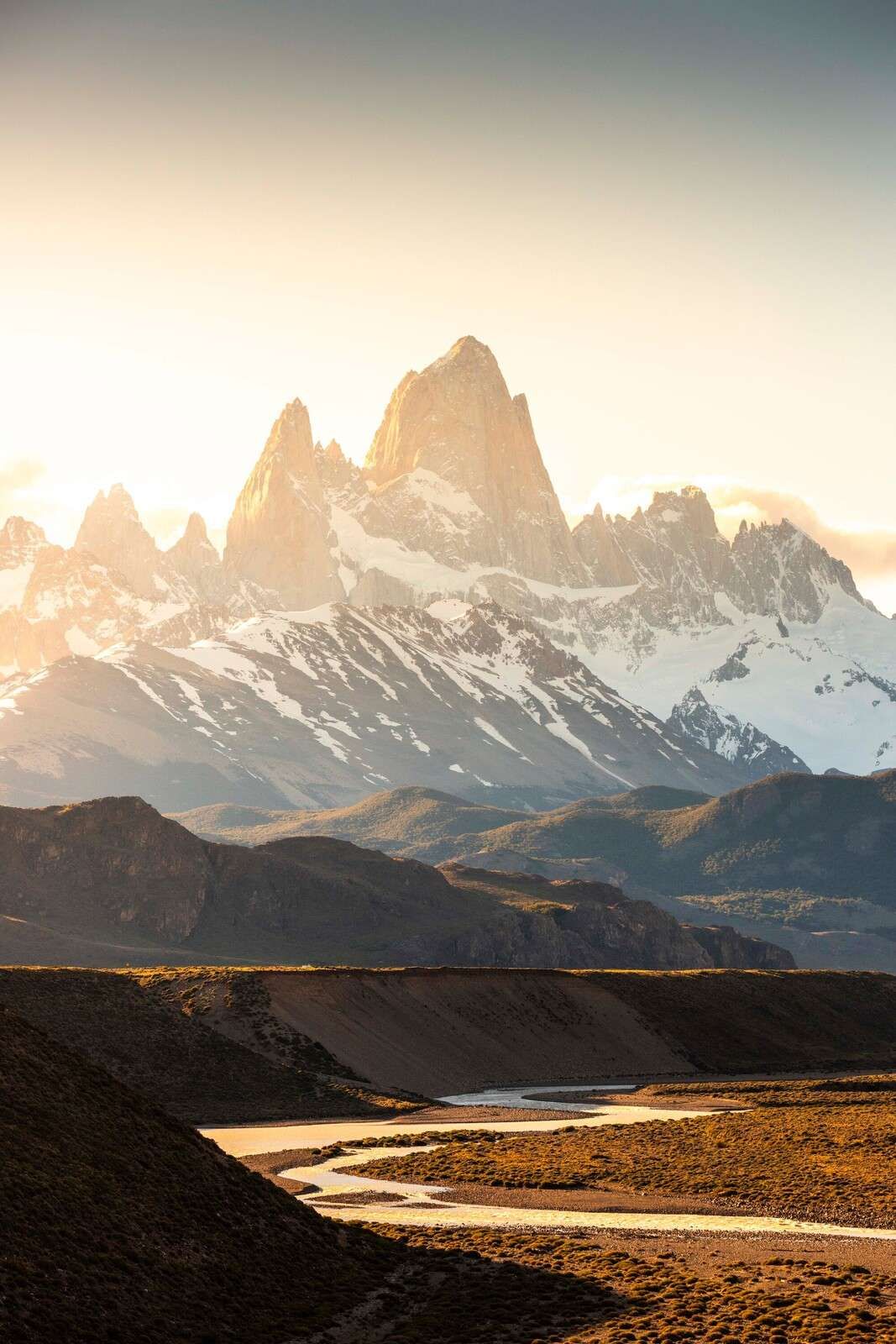 Golden sunrise in mountain valley