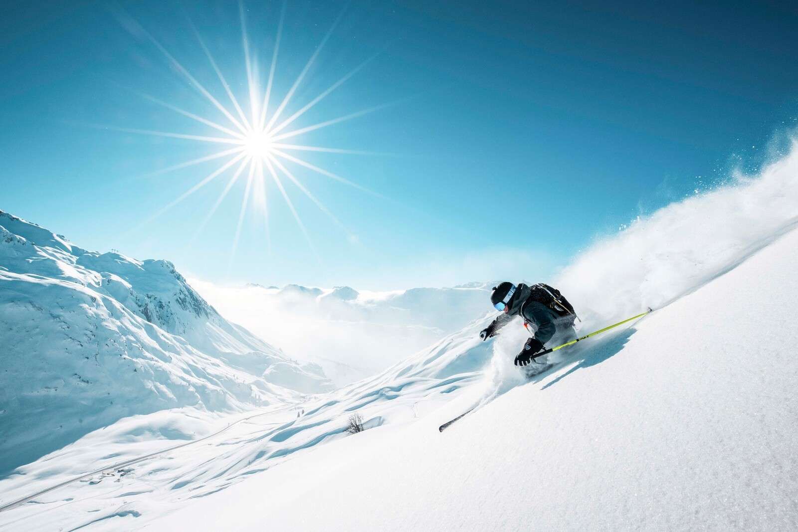 Powder snow under icy winter sun