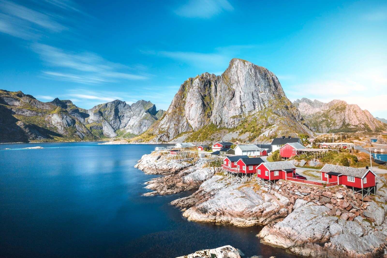 Red fishing houses on a Norwegian fjord