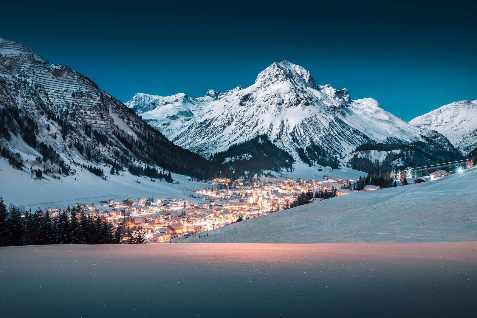 Alpine village in winter evening calm.