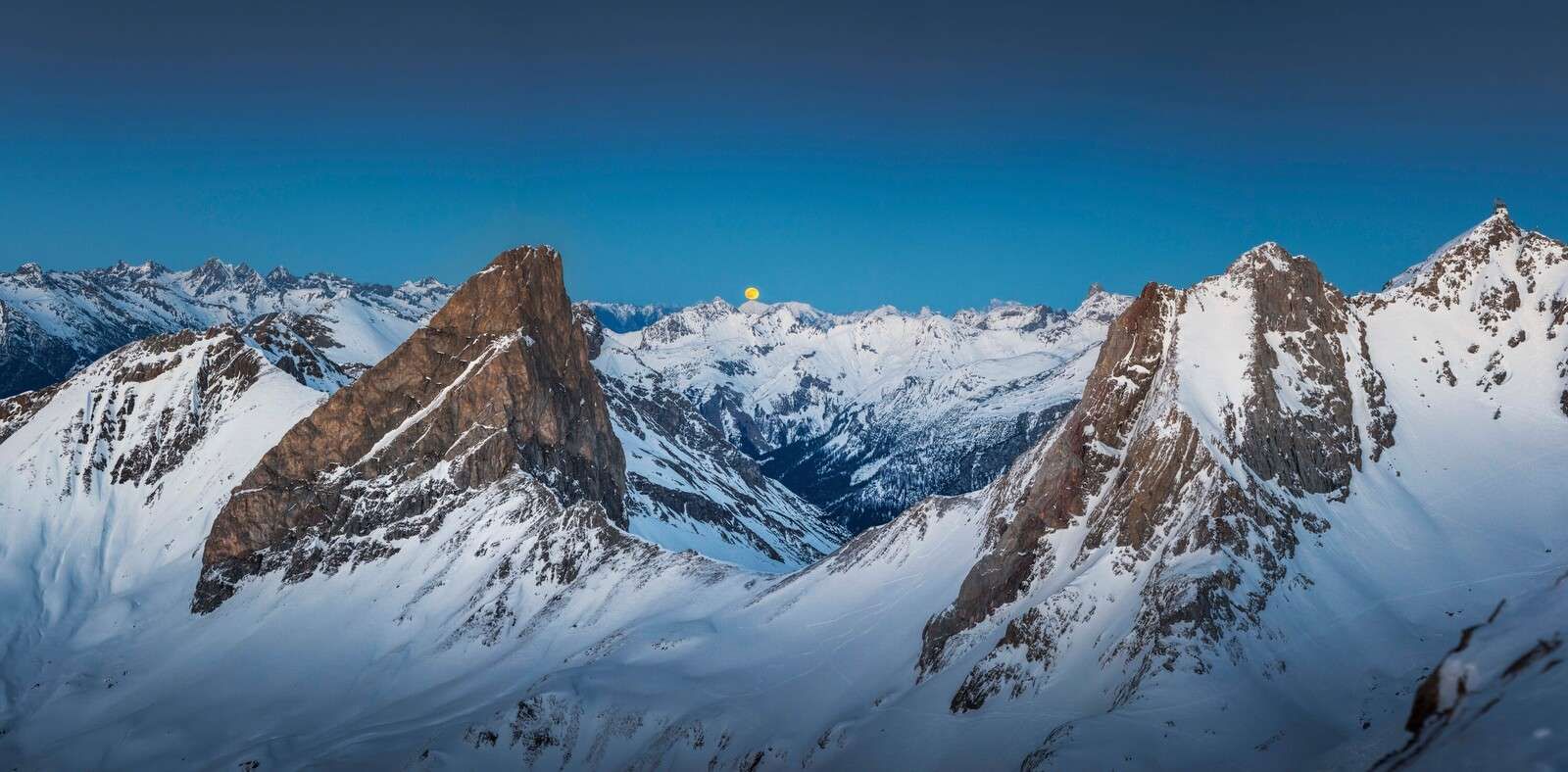 Moonlight above alpine peaks
