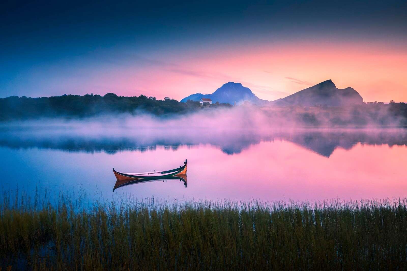 Misty sunrise at the lake