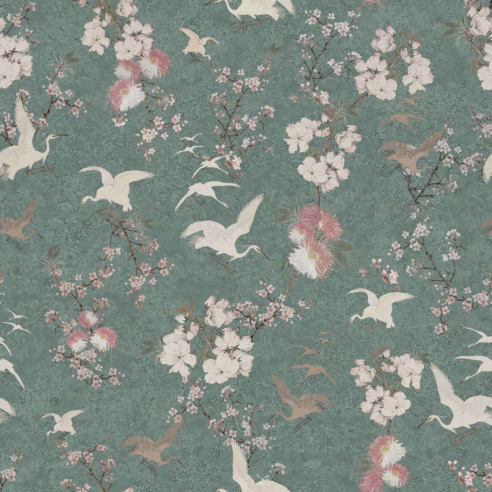 Cranes among blossom branches