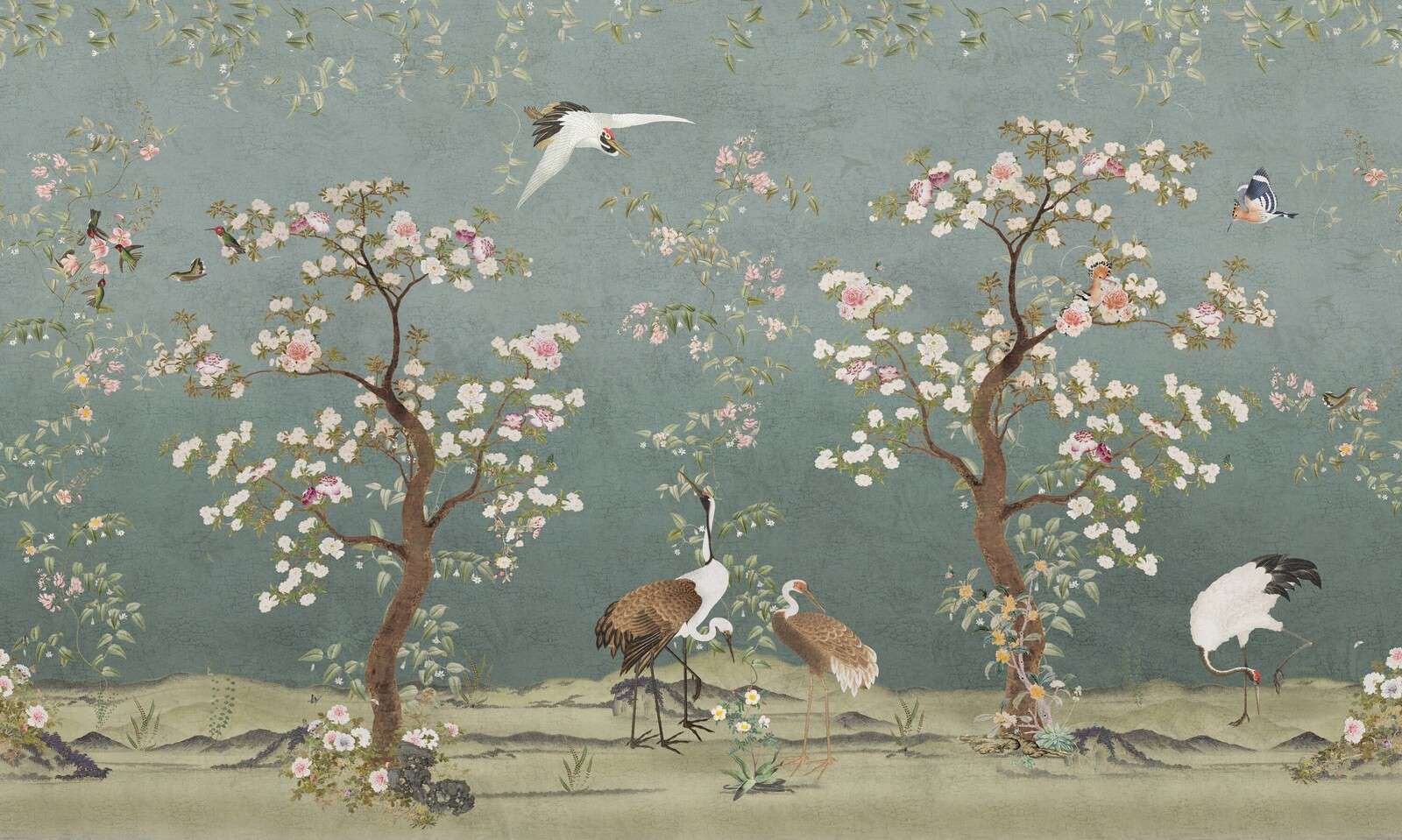 Blossom trees with cranes in a serene garden