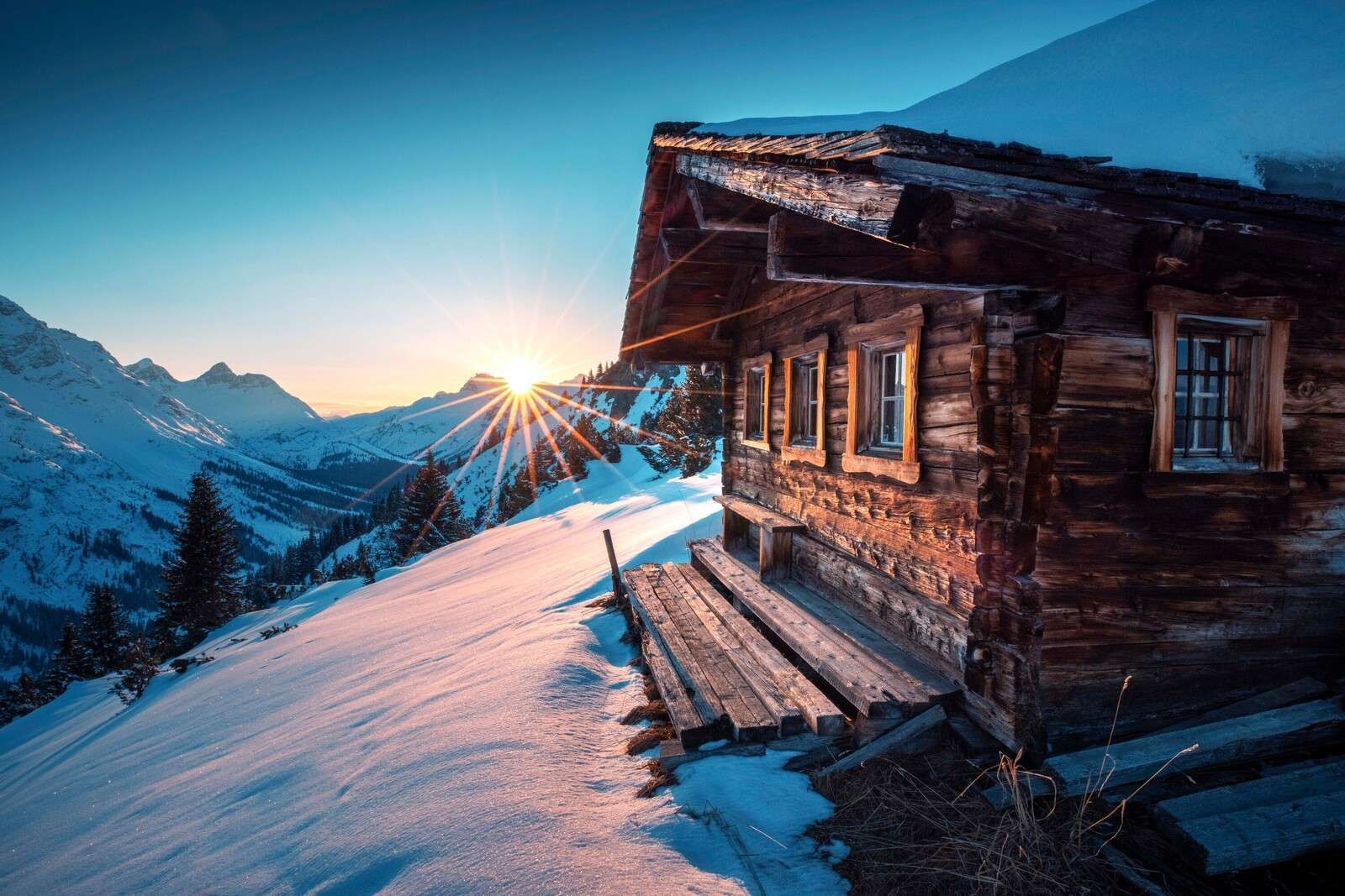 Morning sky at wooden alpine hut