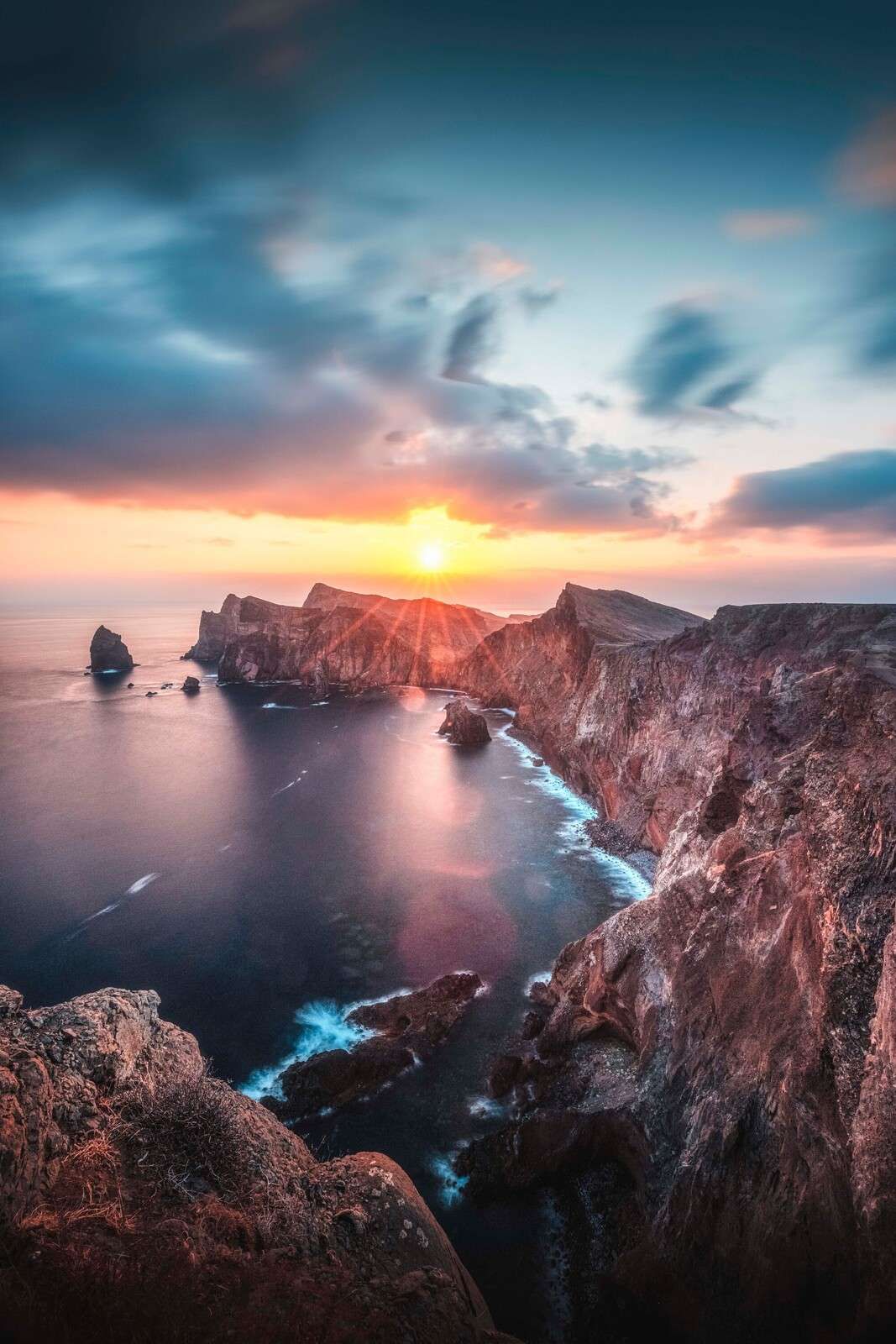 Sunset above rocky coast