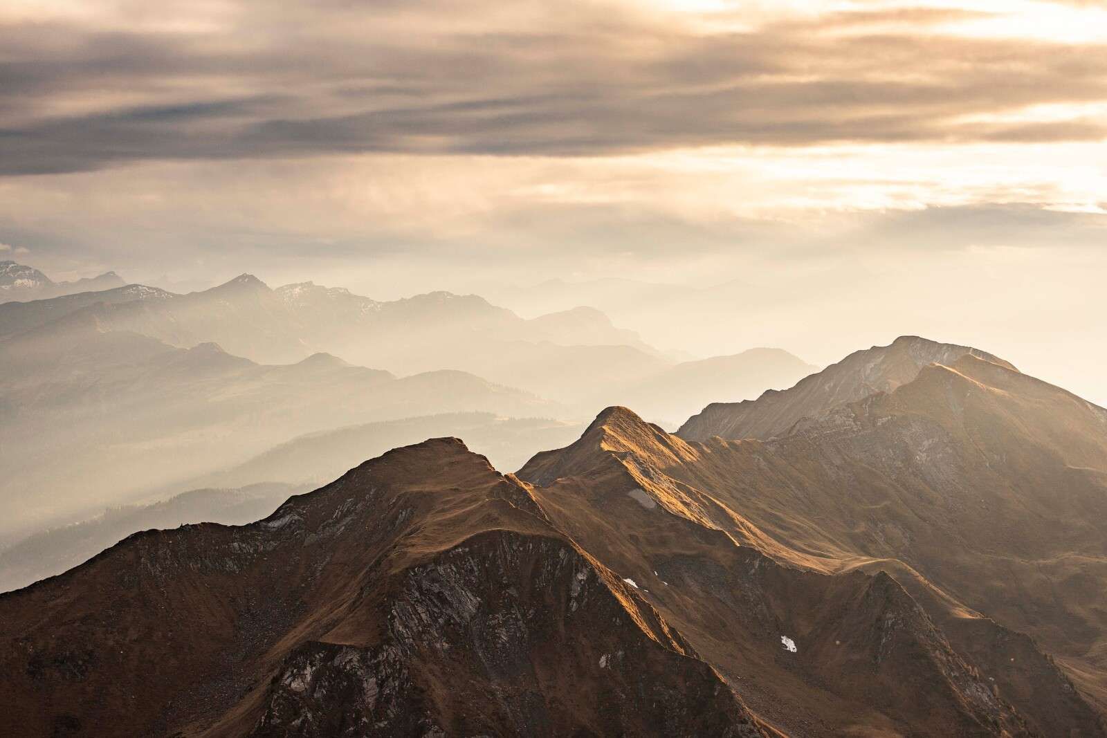 Golden glow over mountain ridge