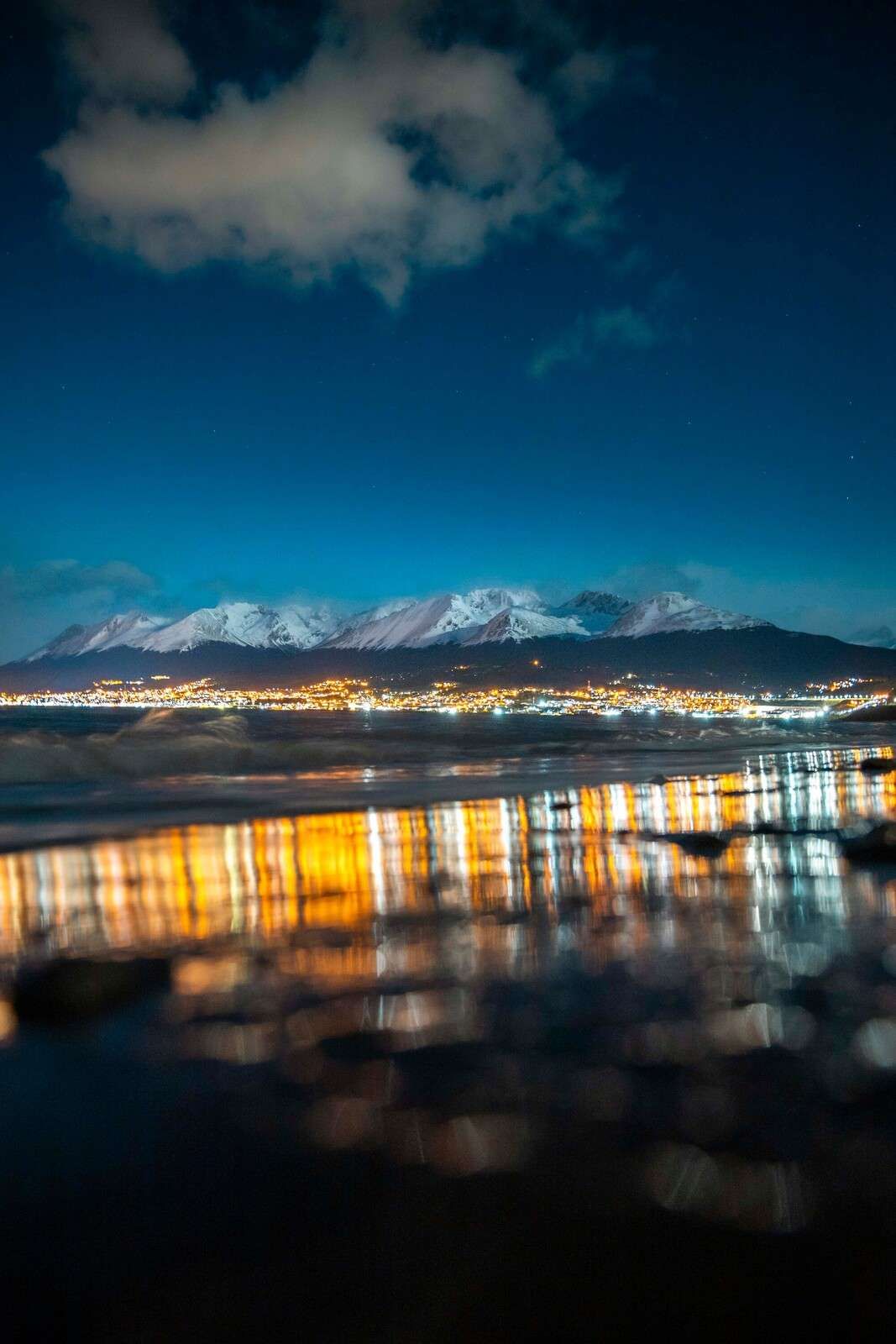Night Light On Snowy Coast