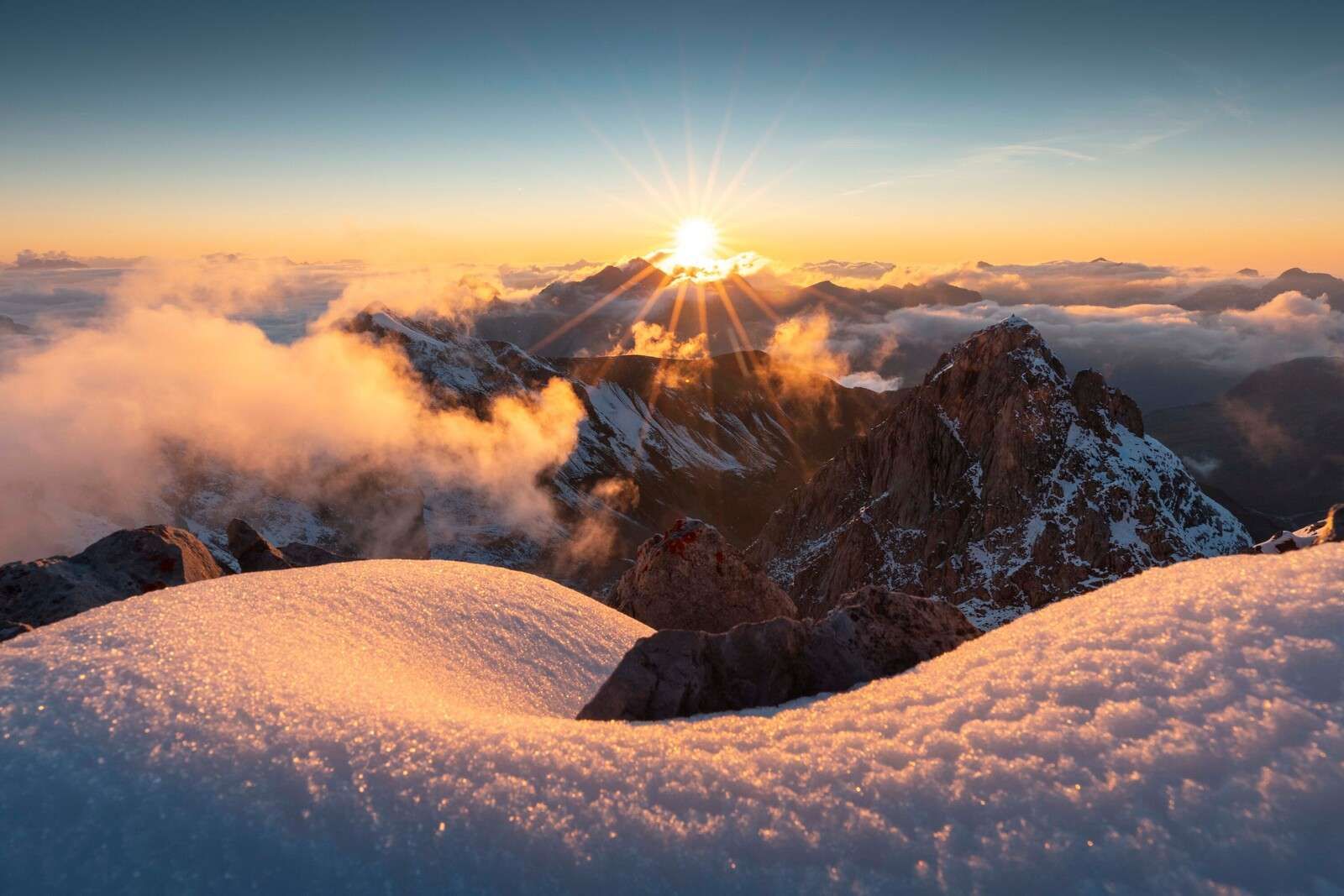 Evening Light Over Winter Mountains
