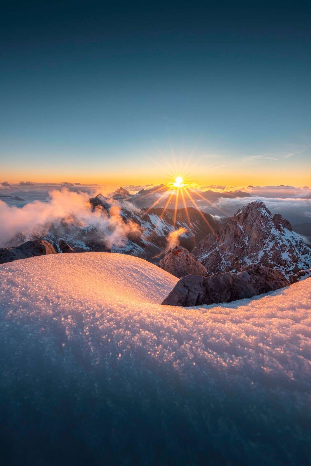 Golden Sun Over Mountain Peaks