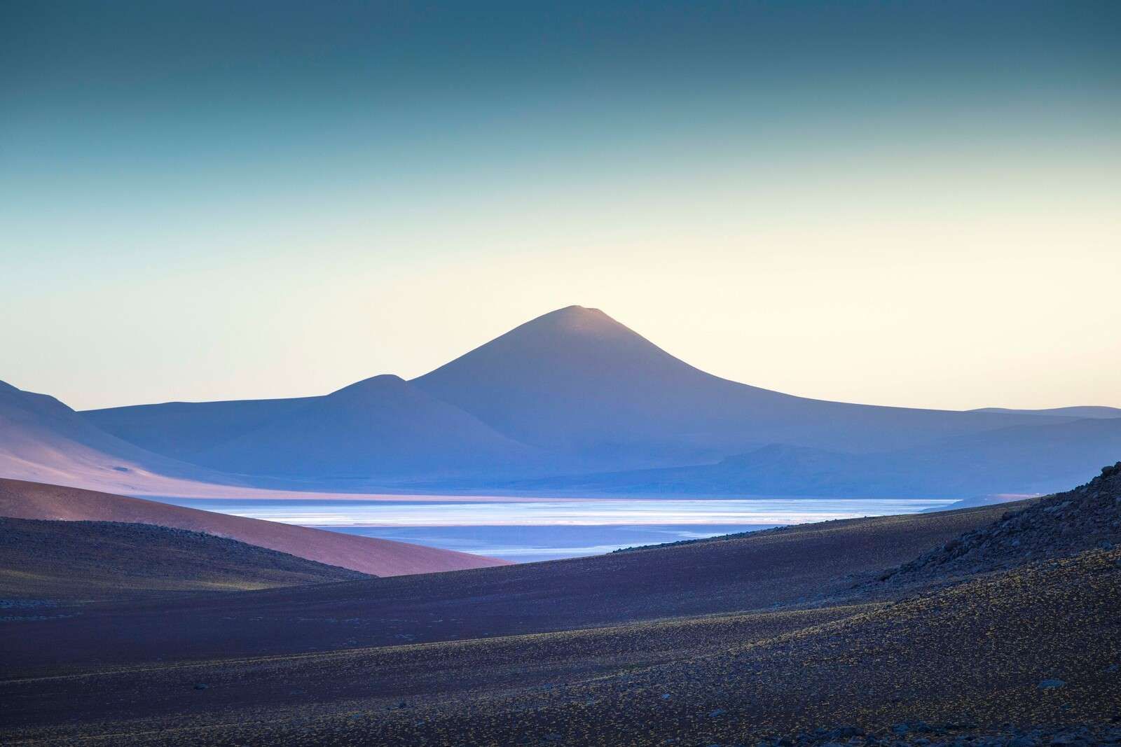 Sunrise Over Volcanic Desert Landscape