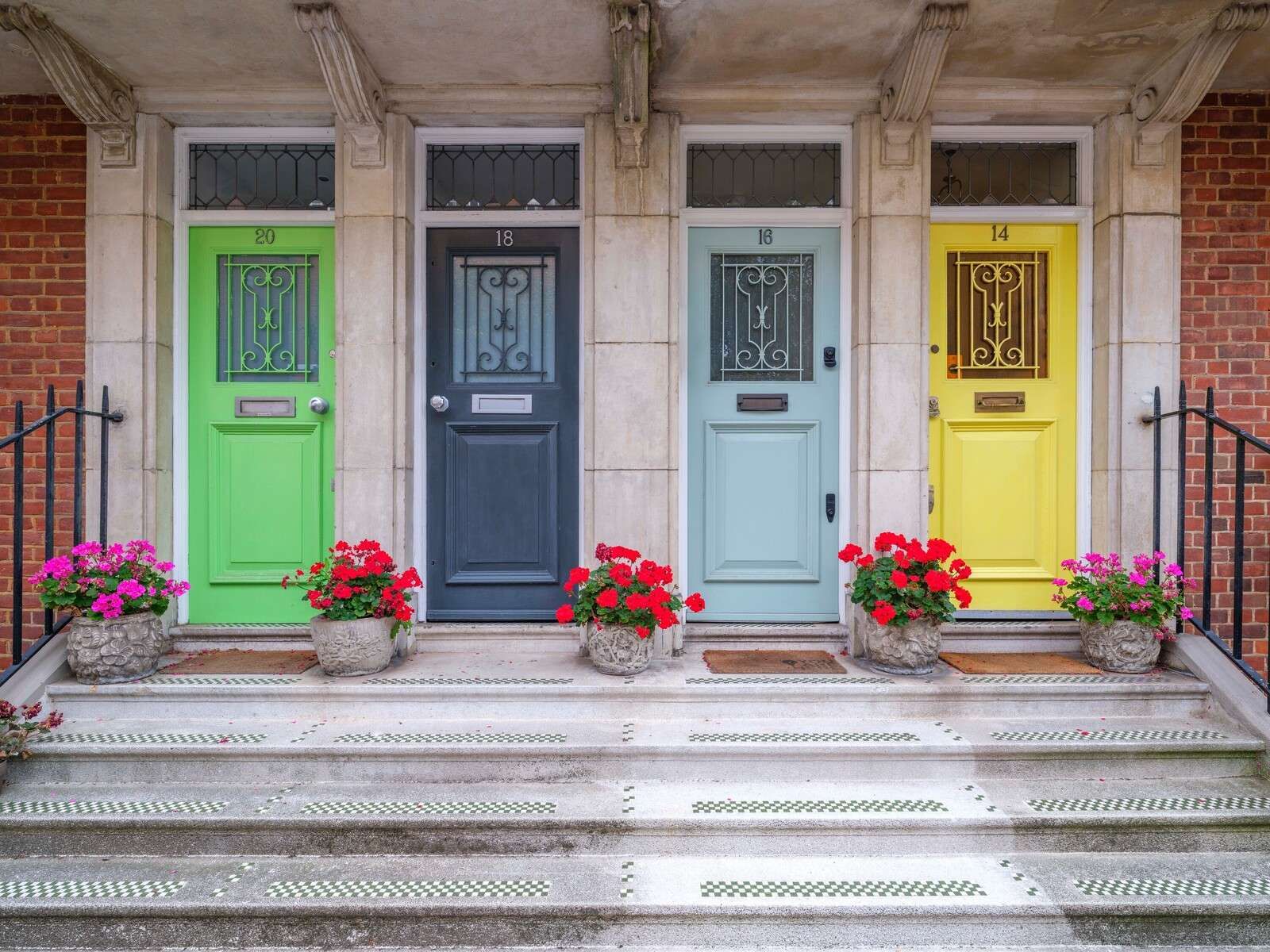 Multicolored doors of residential building, London