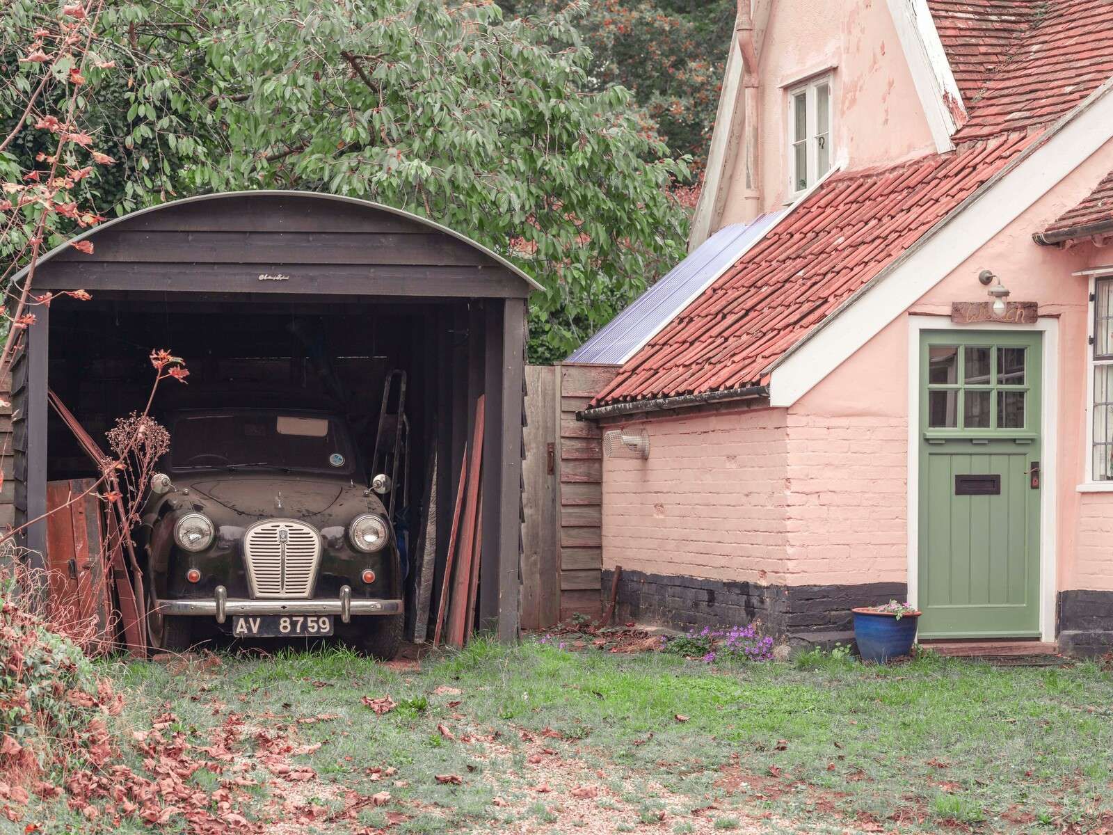 Classic car in the garage of an old house