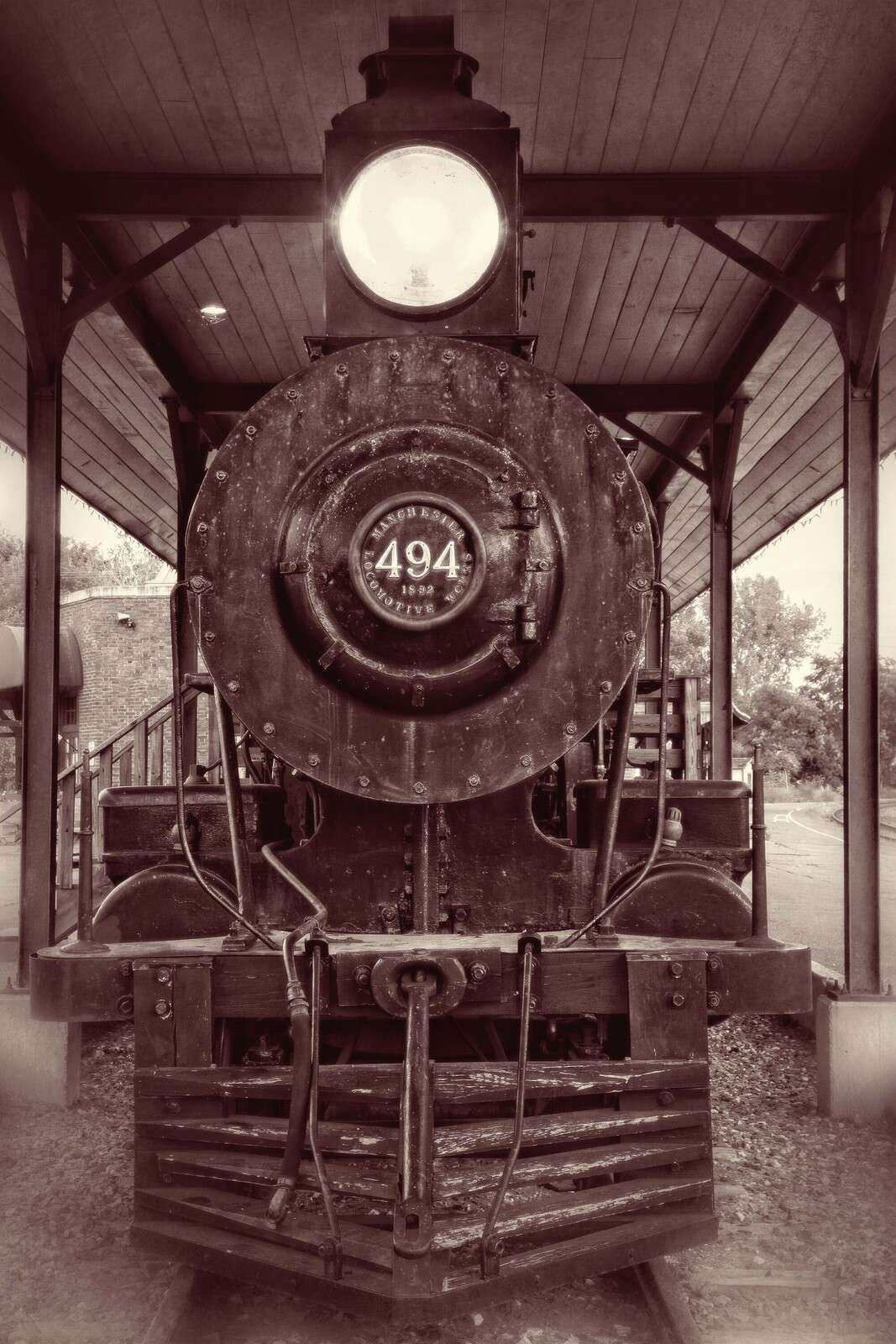 Steam locomotive under the platform