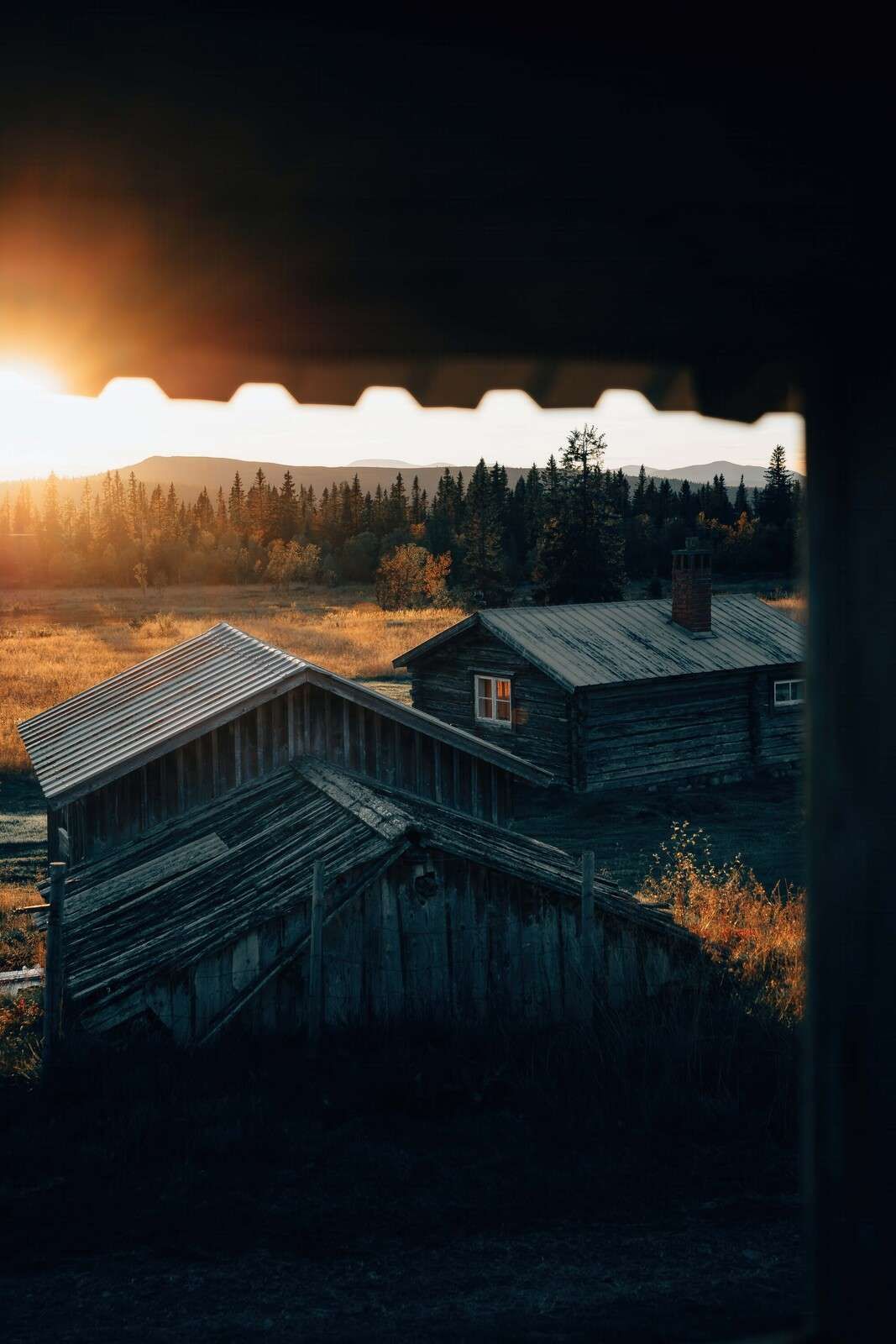 Wooden cabins at sunset