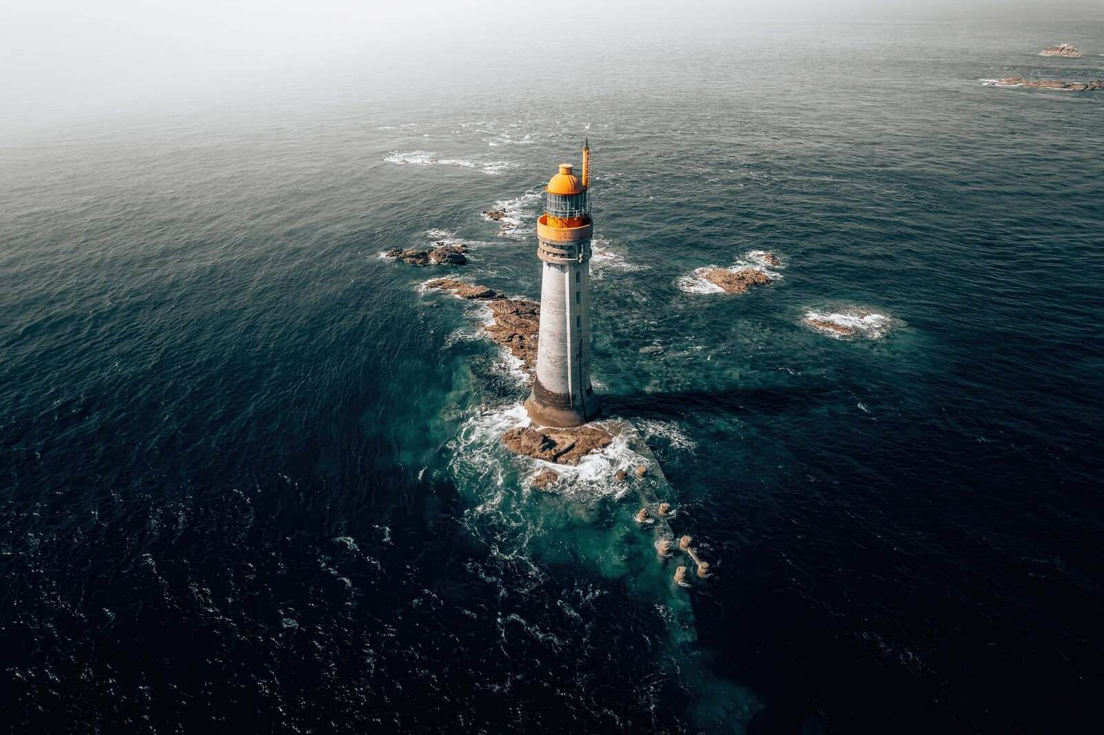 Lighthouse in an endless ocean