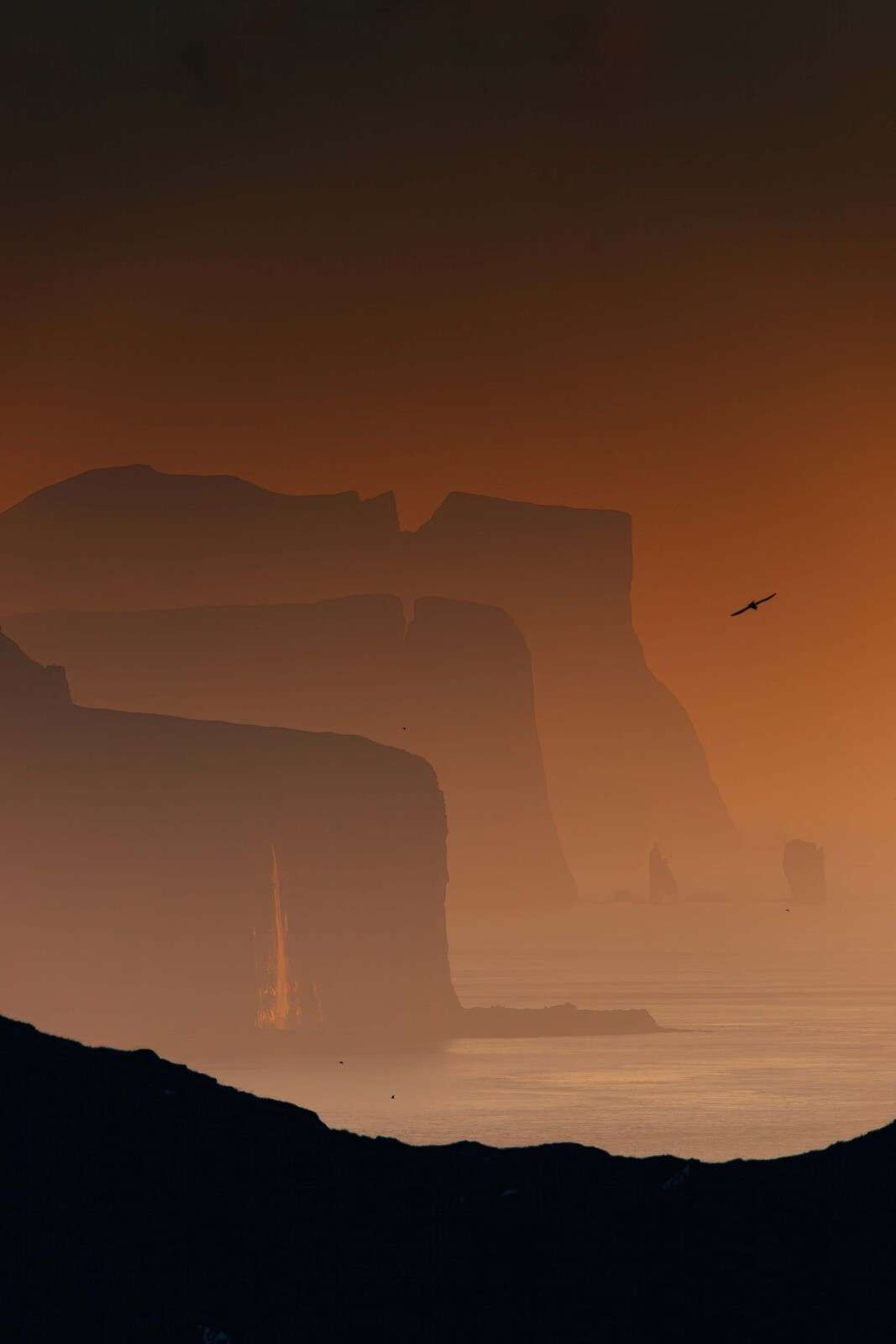 Cliffs in fiery evening glow