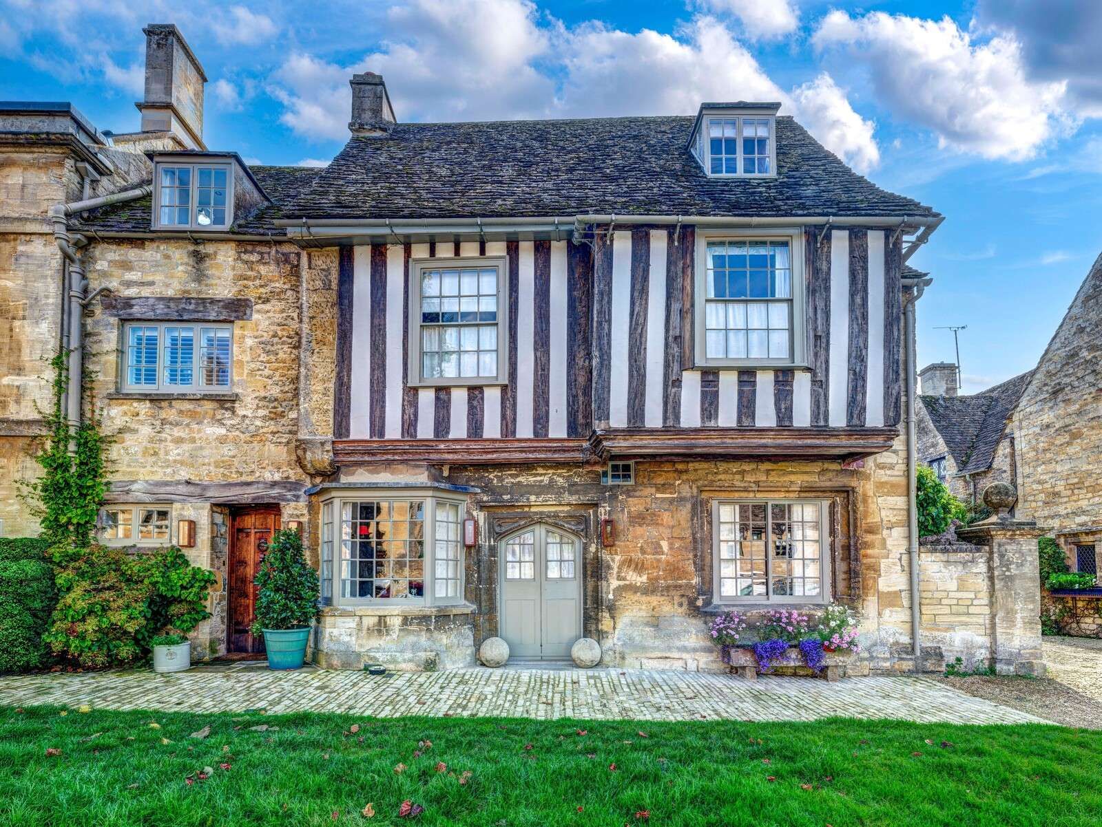 Historic half-timbered house with stone facade