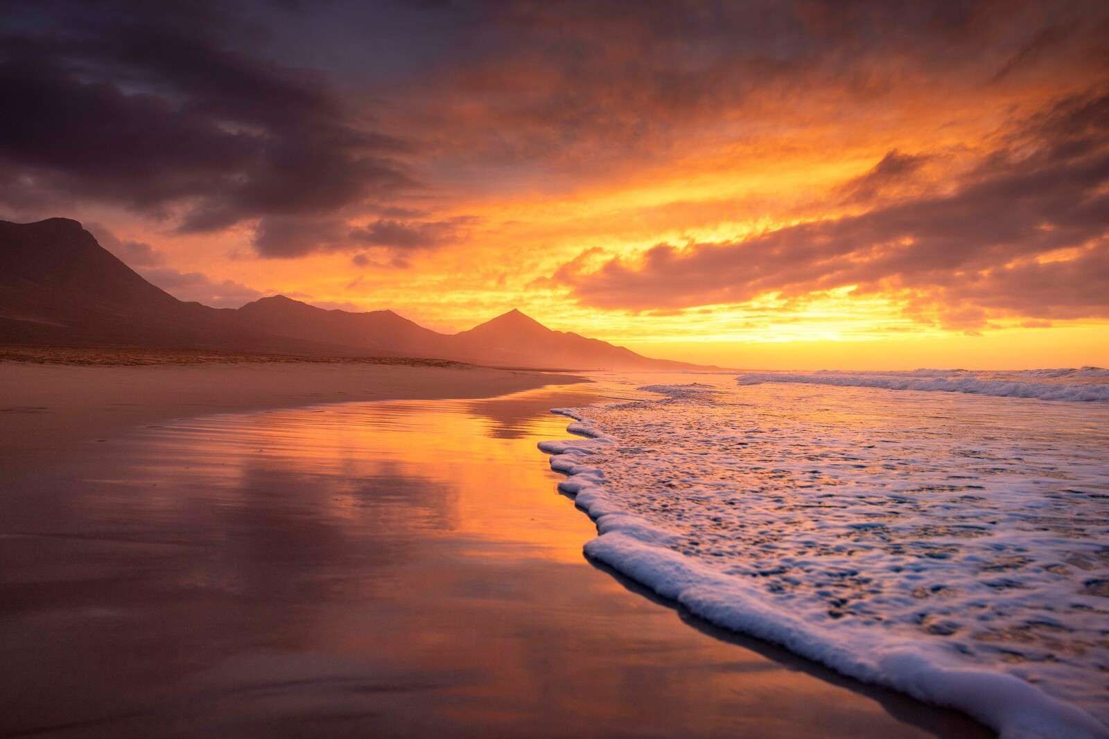 sunset on a mountain beach
