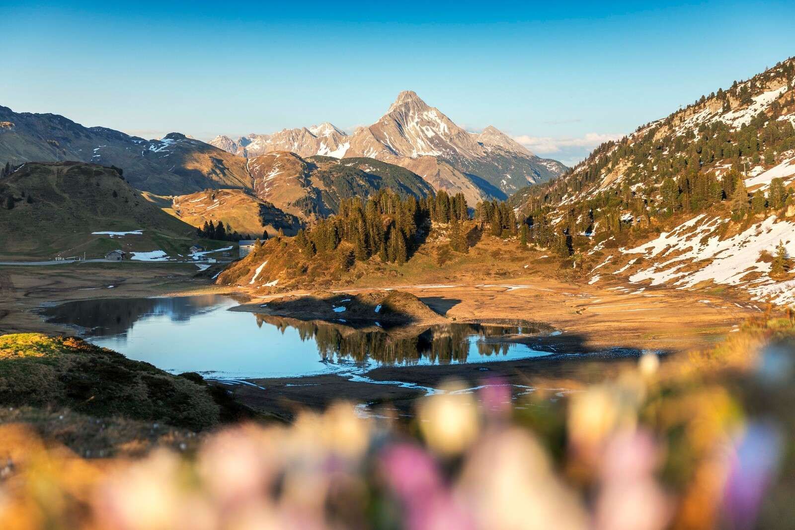 Mountain lake in spring light