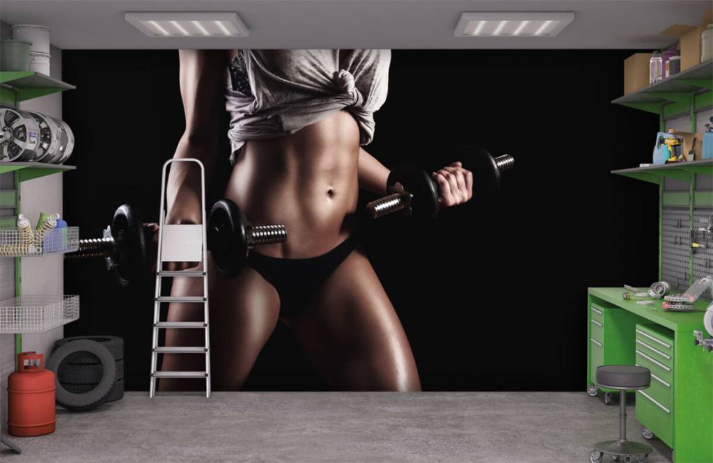 Sports & Fitness - Woman with abdominal muscles - Garage 6
