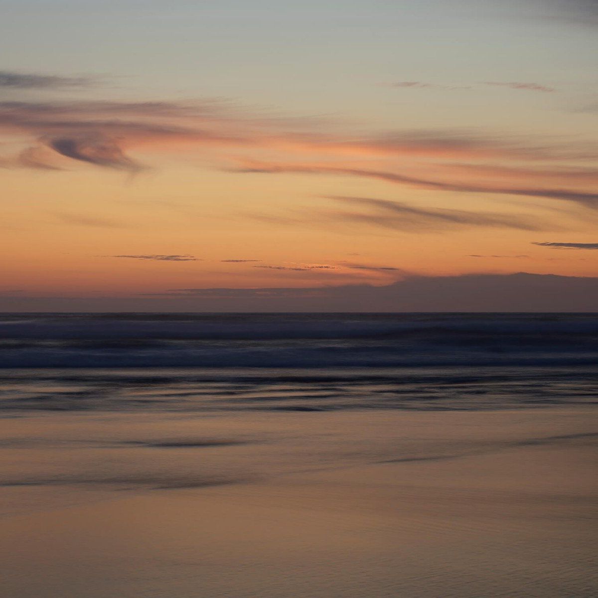 Zonsondergang aan de kust