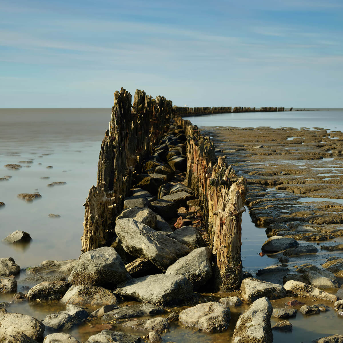 Breakwater of wood and stone