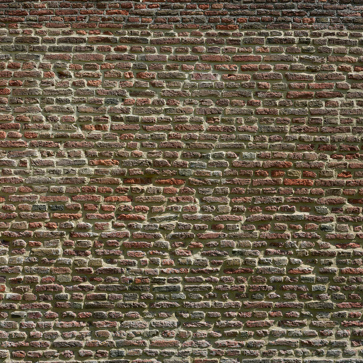 Mauer aus alten Ziegelsteinen