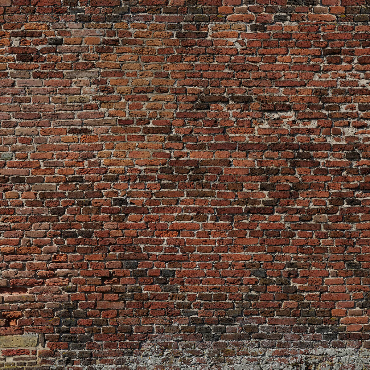 Oude gerestaureerde bakstenen muur