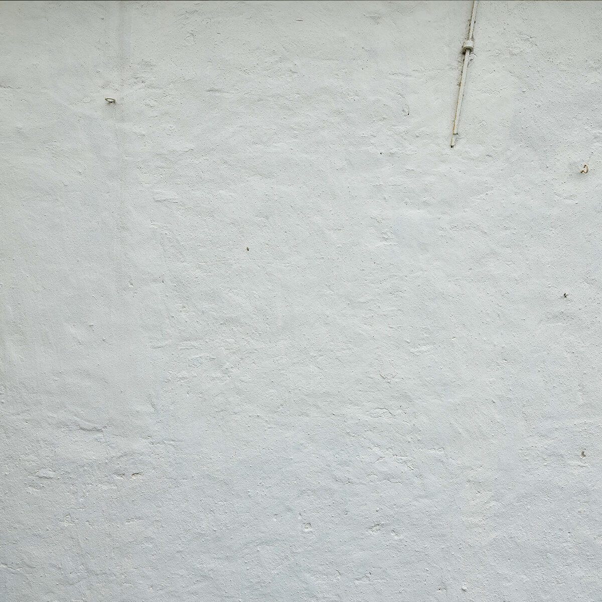 Wall with white stucco