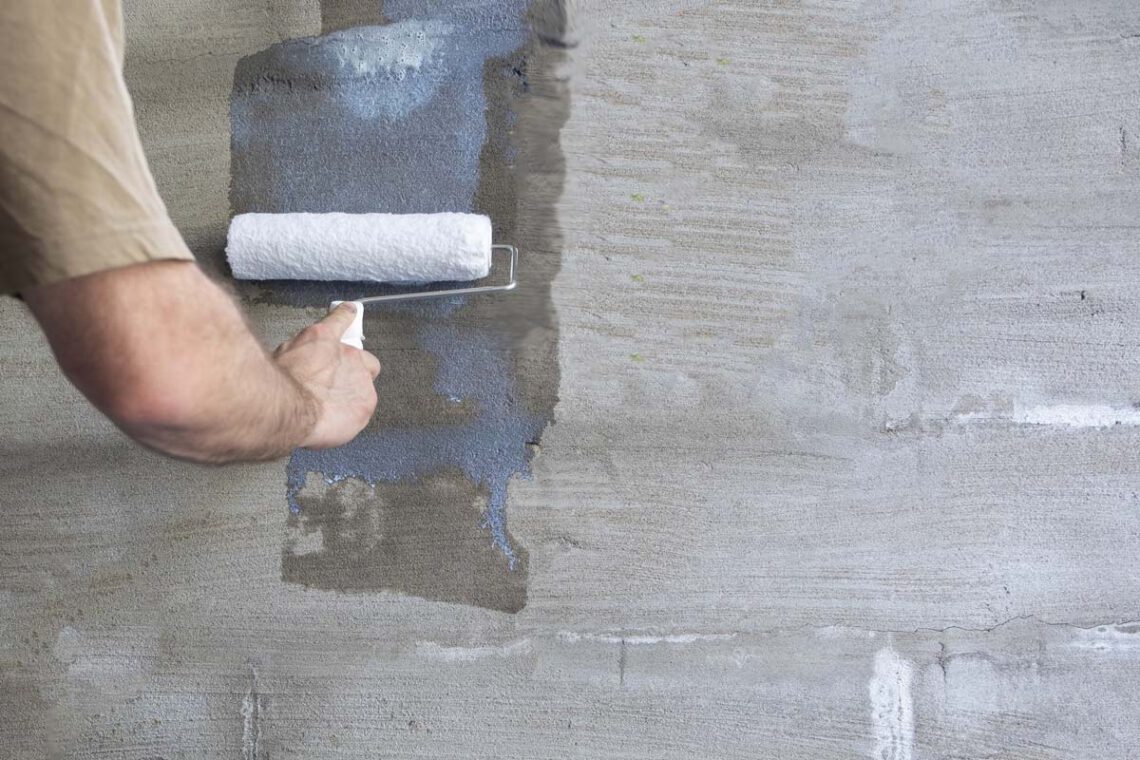 Wallpapering on a painted wall